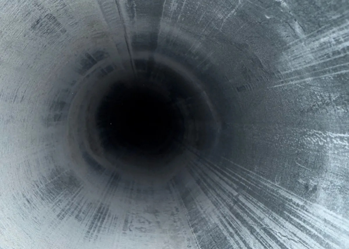 Inside of a dryer vent duct after professional lint removal in California